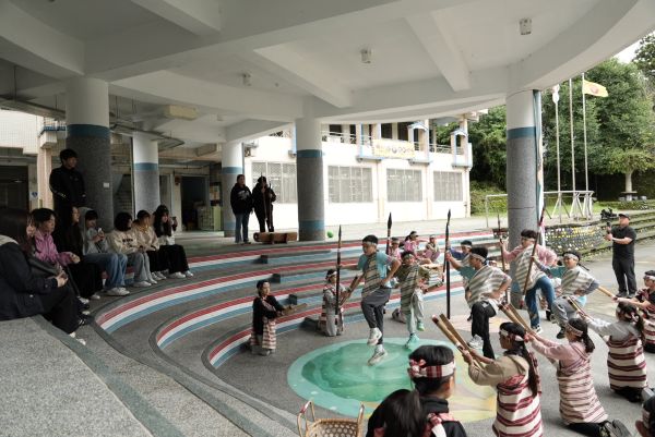 Group photo of NSO musician, youth musicians, and students.